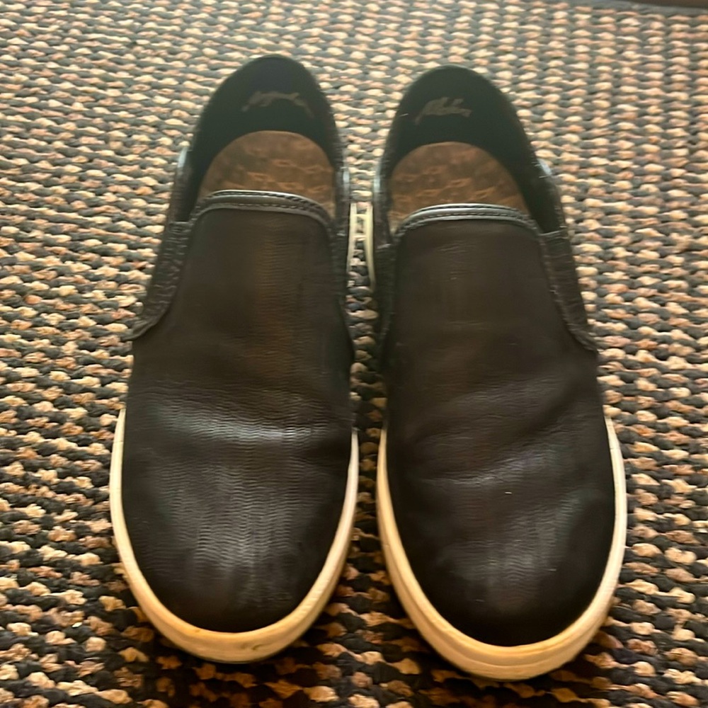 Gently used olukai black slip on 7.5 shoes- great condition
